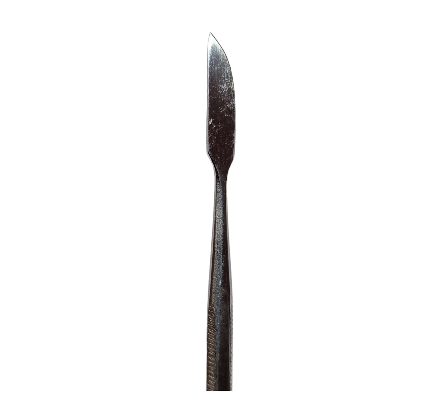 Close up of a wax carving tool