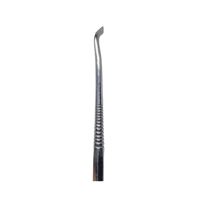 A stainless steel double-ended wax carving tool with a textured grip.