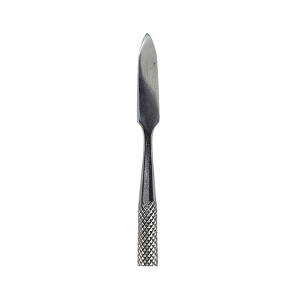 Close up of wax carving tool