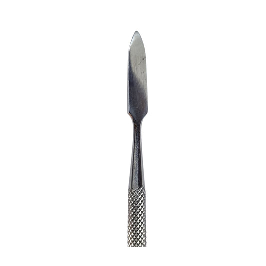 Close up of wax carving tool