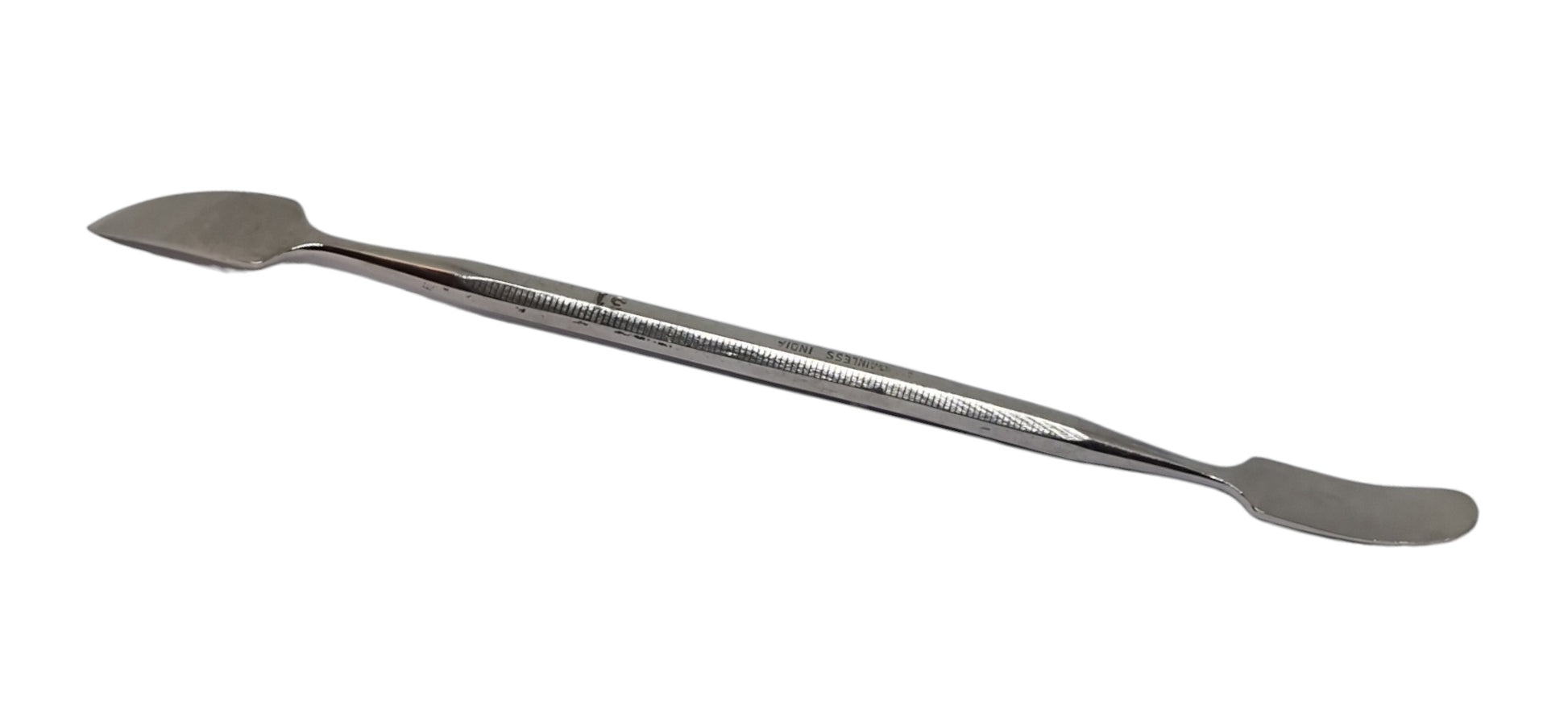 Double ended wax carving tool on a white background