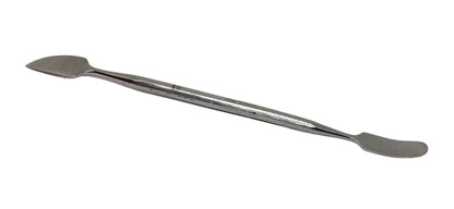 Double ended wax carving tool on a white background