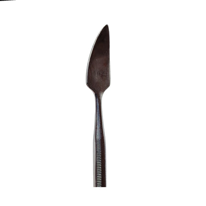 Close up of a wax carving tool