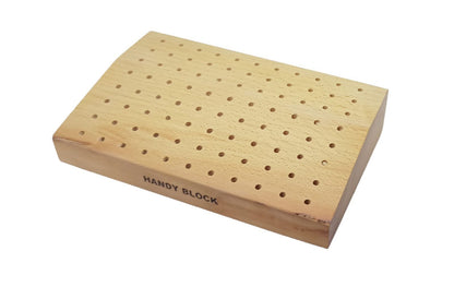 Wooden storage block for drills