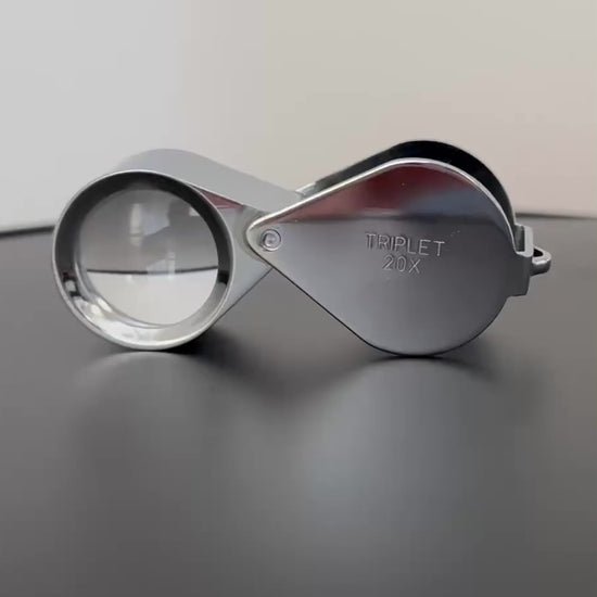 Video of a chrome loupe rotating