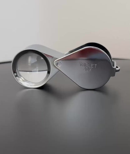 Video of a chrome loupe rotating